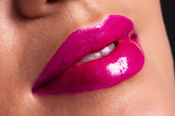 Pink lips smiling.