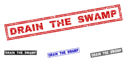 Grunge DRAIN THE SWAMP rectangle stamp seals isolated on a white background. Rectangular seals with distress texture in red, blue, black and grey colors.
