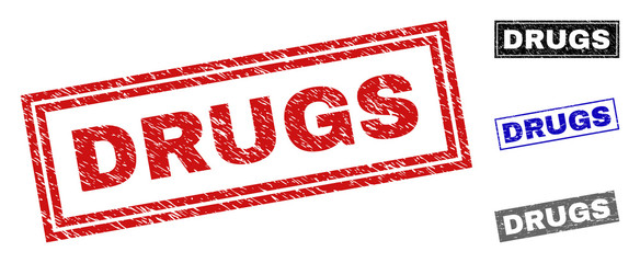 Grunge DRUGS rectangle stamp seals isolated on a white background. Rectangular seals with grunge texture in red, blue, black and gray colors.