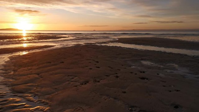 Sunrise in leven Fife scotland with sand river abd sea