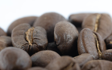 Closeup of a top of a pile of coffee beans