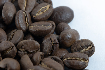 Closeup of a side of a pile of coffee beans