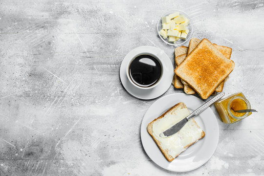 Toasted Bread With Butter And Hot Coffee.