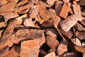 A heap of red wood chips