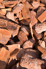 A heap of red wood chips