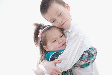 hugging friends isolated on white background. Happy children mis © aynur_sh