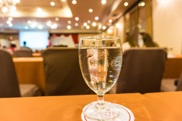 Drinking water glass on table in seminar room