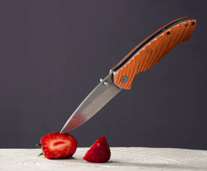 knife slicing fruit