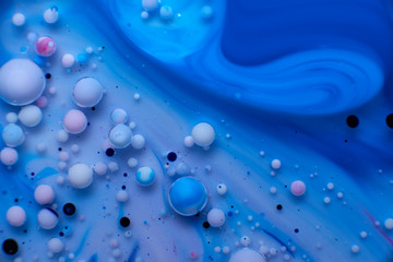 abstract background of stains and paint bubbles in liquid