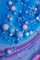 abstract background of colored drops of water and oil