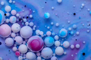 abstract background of colored drops of water and oil