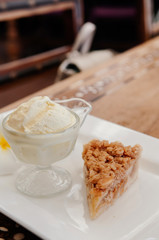 Crispy apple crumble pie with vanilla ice cream