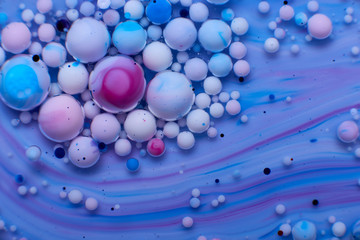 abstract background of stains and paint bubbles in liquid