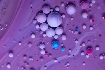 abstract background of stains and paint bubbles in liquid
