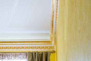 Gold-plated decorative stuccoon the celling © Evgeny Korshenkov
