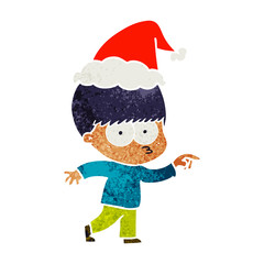 nervous retro cartoon of a boy wearing santa hat