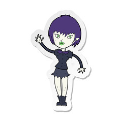 sticker of a cartoon vampire girl