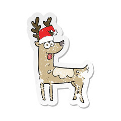 retro distressed sticker of a cartoon crazy reindeer
