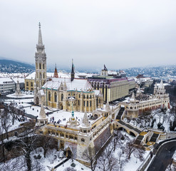 Budapest, Hungary - Aerial view of the famous Fisherman's Bastion and Matthias Church on a snowy winter day