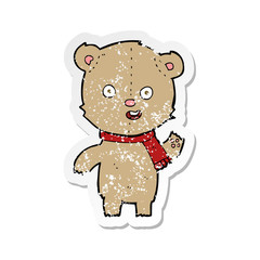 retro distressed sticker of a cartoon waving teddy bear with scarf