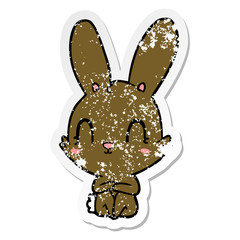 distressed sticker of a cute cartoon rabbit