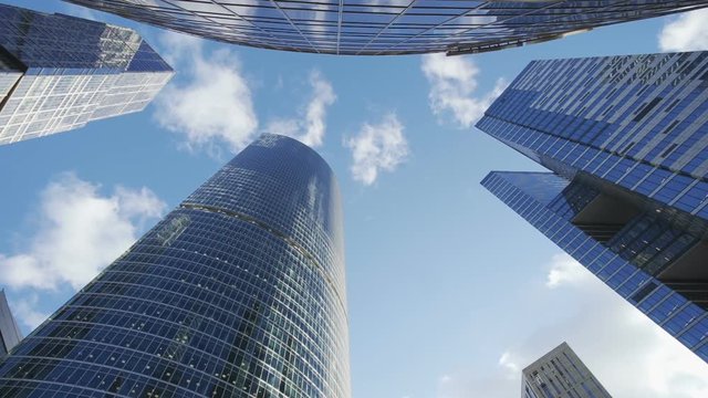 Seamless loop - Looking up at business buildings