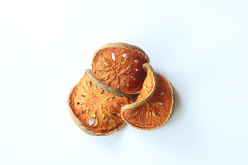 Dry quince slides on white background.