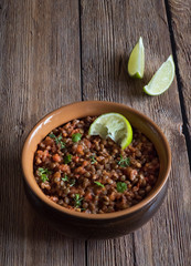 Stewed in a pot of lentils with vegetables. 