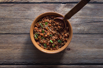 Stewed in a pot of lentils with vegetables. 