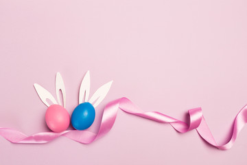 easter eggs on pink background