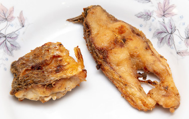 Fish fried in a pan in oil