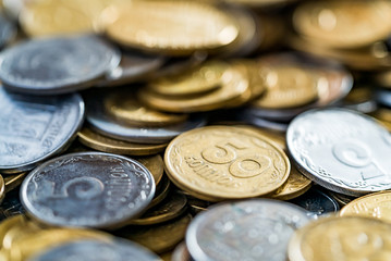 Metal coins, selective focus.