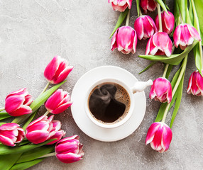 Cup of coffee and tulips