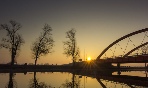 Red bridge over the Bosut river in Vinkovci, Croatia