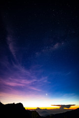 Dawn time with milkyway on dark sky above
