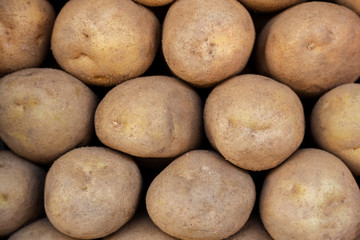 Potatoes background. Top view, closeup