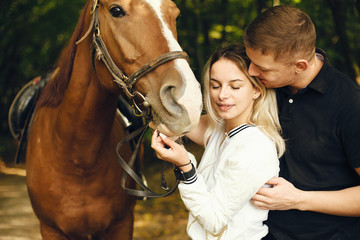 Obraz premium couple with horses