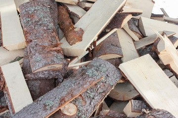 the sawn boards, firewood for a kindling of the furnace or a fireplace