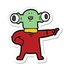 sticker of a friendly cartoon alien pointing