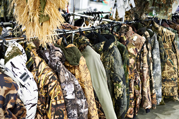 Camouflage clothing for hunters in shop