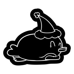 penguin lying on belly wearing santa hat