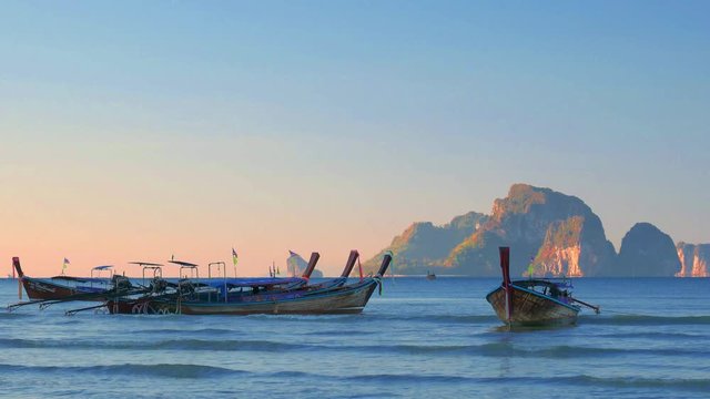 Ao Nang beach at sunset in Krabi Thailand
