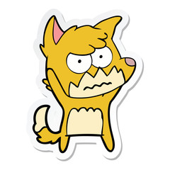 sticker of a cartoon annoyed fox