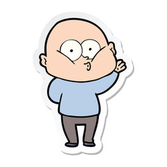 sticker of a cartoon bald man staring