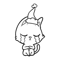 crying line drawing of a cat sitting wearing santa hat