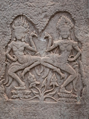 Fototapeta na wymiar Angkor Wat Temple wall carvings, Cambodia
