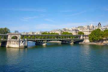 Fototapeta na wymiar Famous Bir Hakeim bridge view and Seine river in a sunny summer day in Paris, France