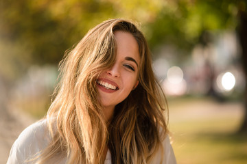 Young girl posing stylishly in front of camera