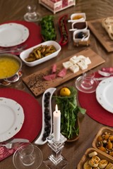 breakfast table with olives, cheese, jam  and turkish base
