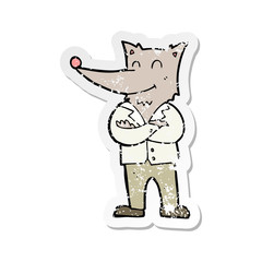 retro distressed sticker of a cartoon wolf in shirt